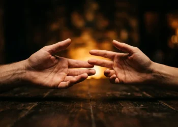 Two hands reaching toward each other — empathy test