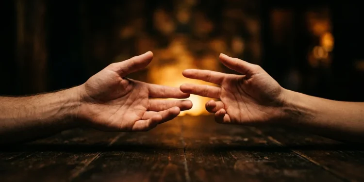 Two hands reaching toward each other — empathy test