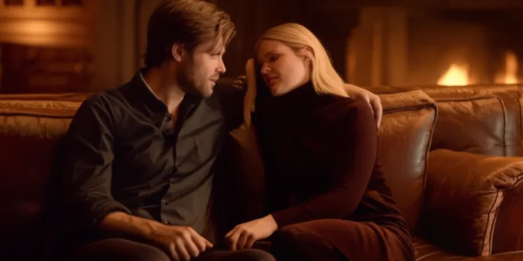 Couple sitting together on couch in warm amber light - relationship compatibility quiz