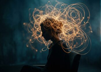 Profile silhouette with glowing amber recursive light loops emerging from the head, representing the mental loops of overthinking